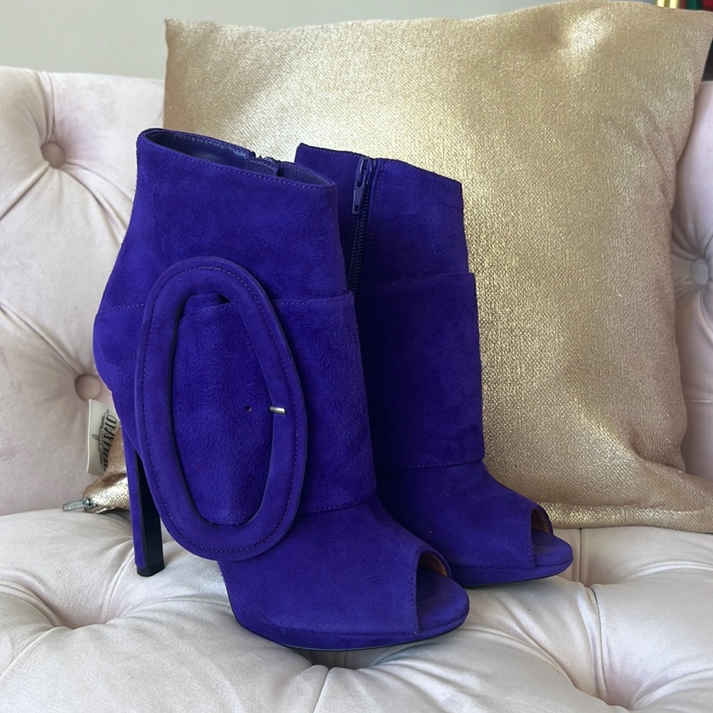 Beautiful purple suede booties. Made by Italian designer Edmundo Castillo